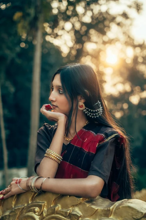 Young woman in traditional indian attire outdoors