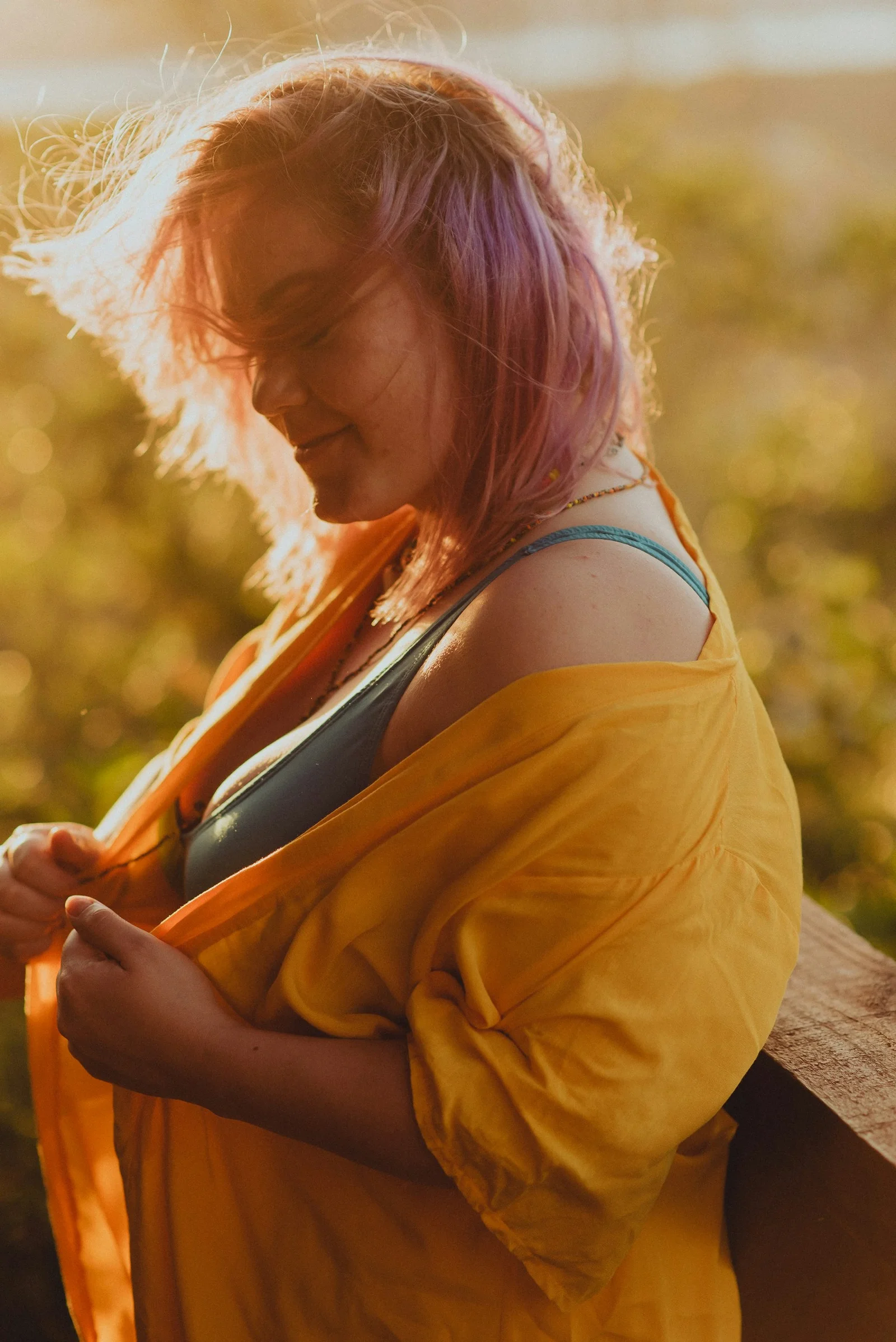 a woman with pink hair