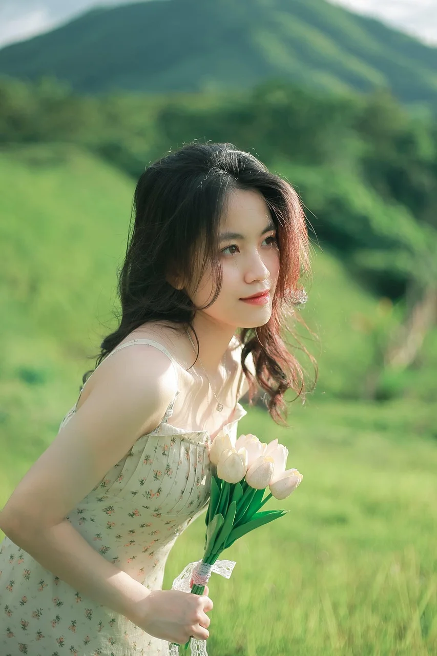 asian woman, tulips, portrait, grass