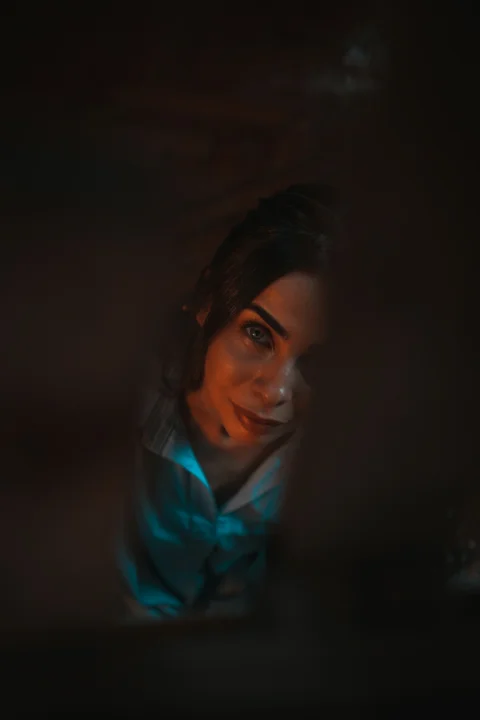 woman in blue and white collared shirt