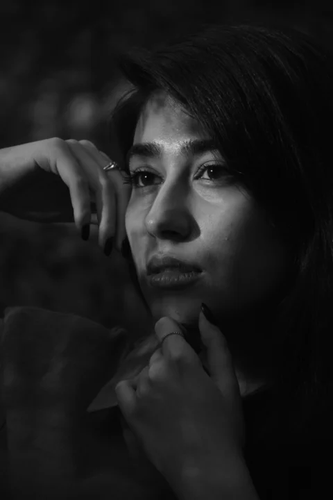 A black and white photo of a woman