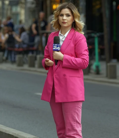woman, news anchor, reporter, pink suit