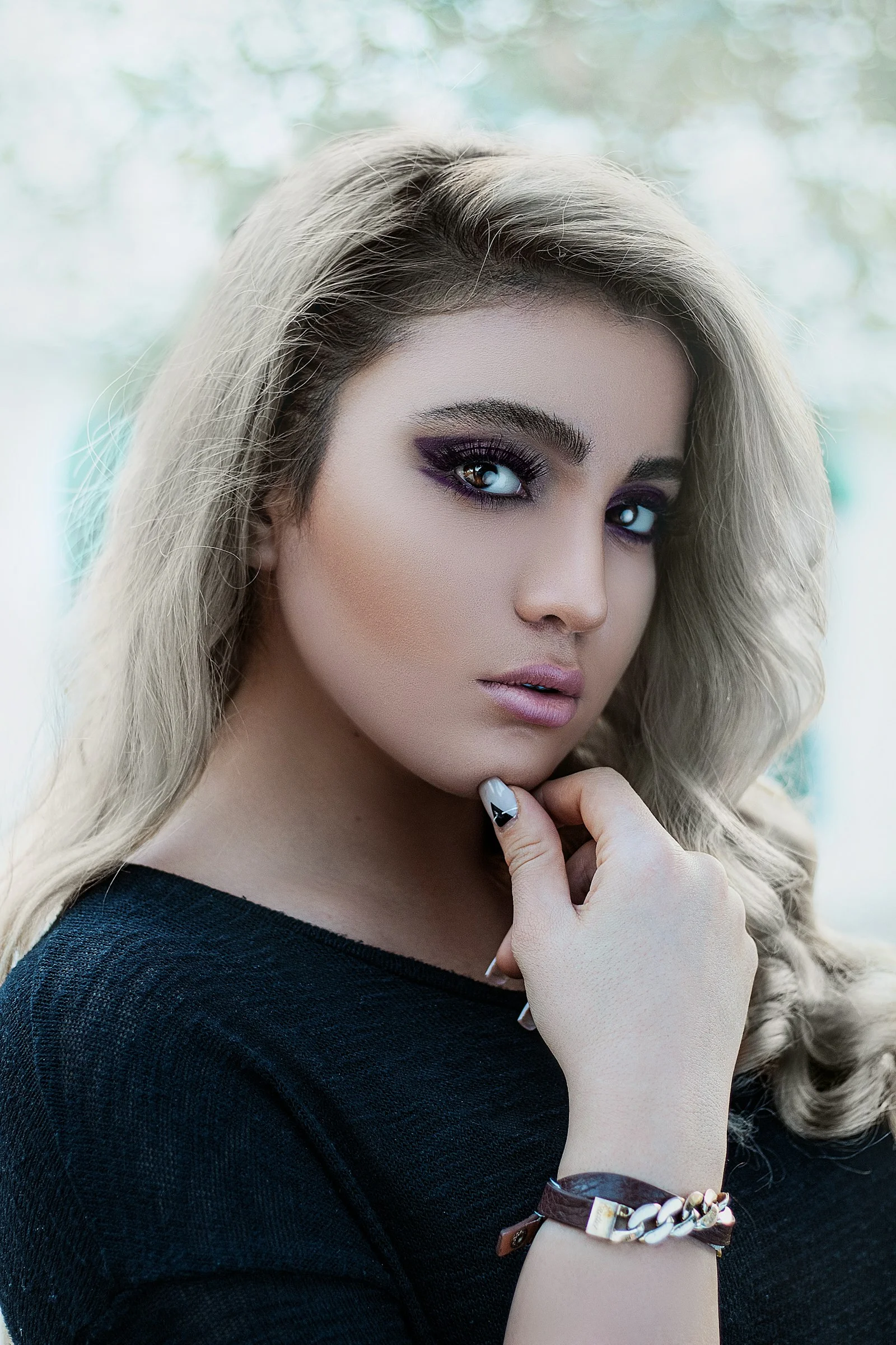 woman in black shirt with silver ring