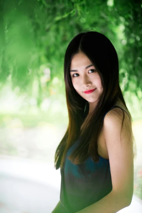 woman in blue sleeveless top