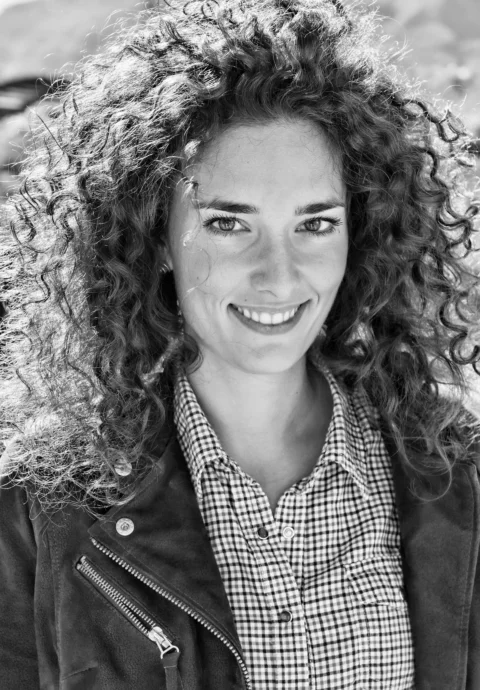 woman in black and white checkered button up shirt