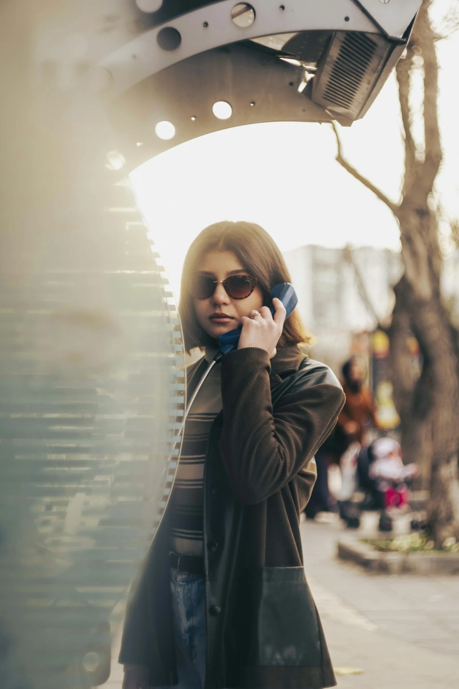 a woman is talking on a cell phone