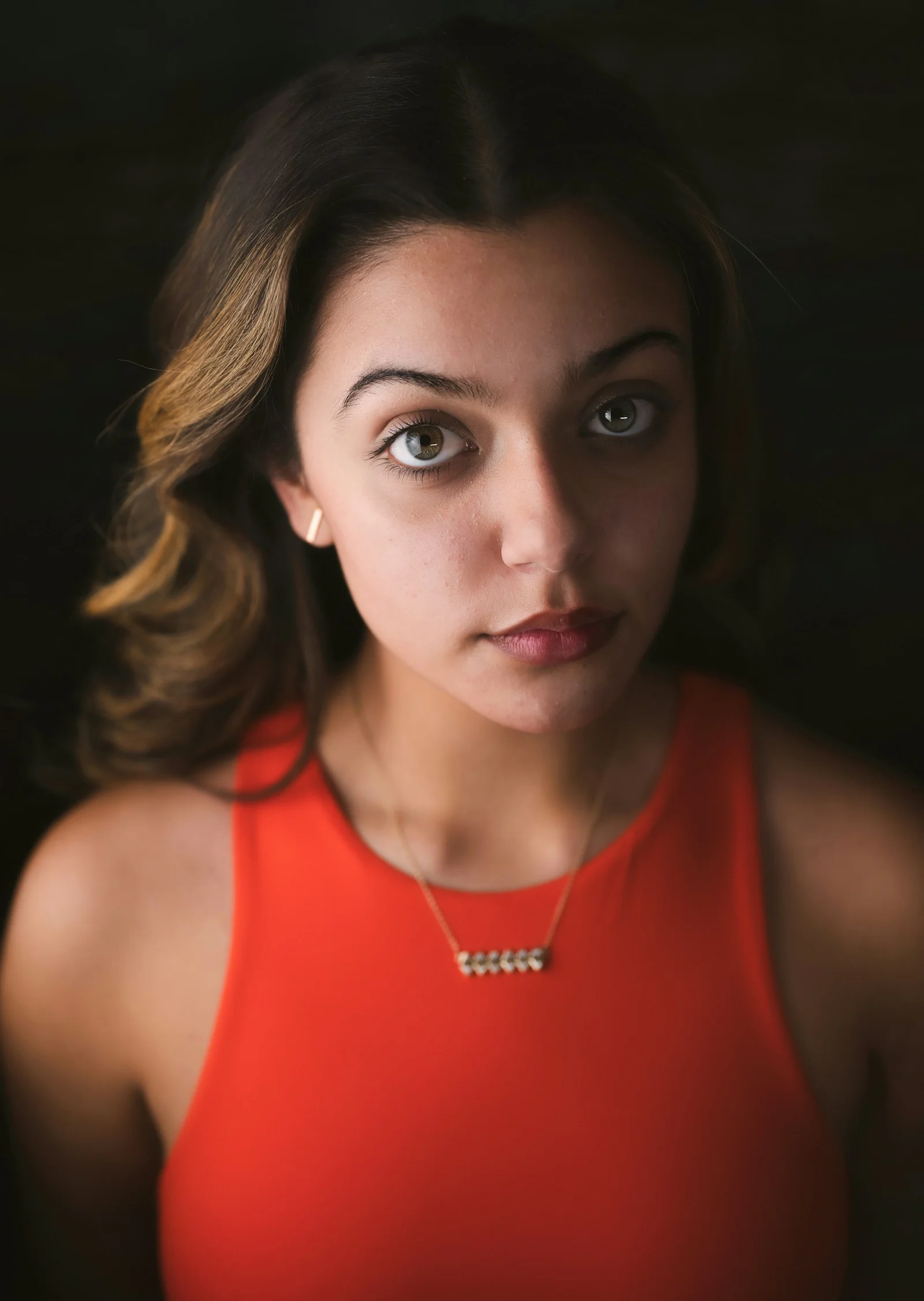 woman in orange tank top
