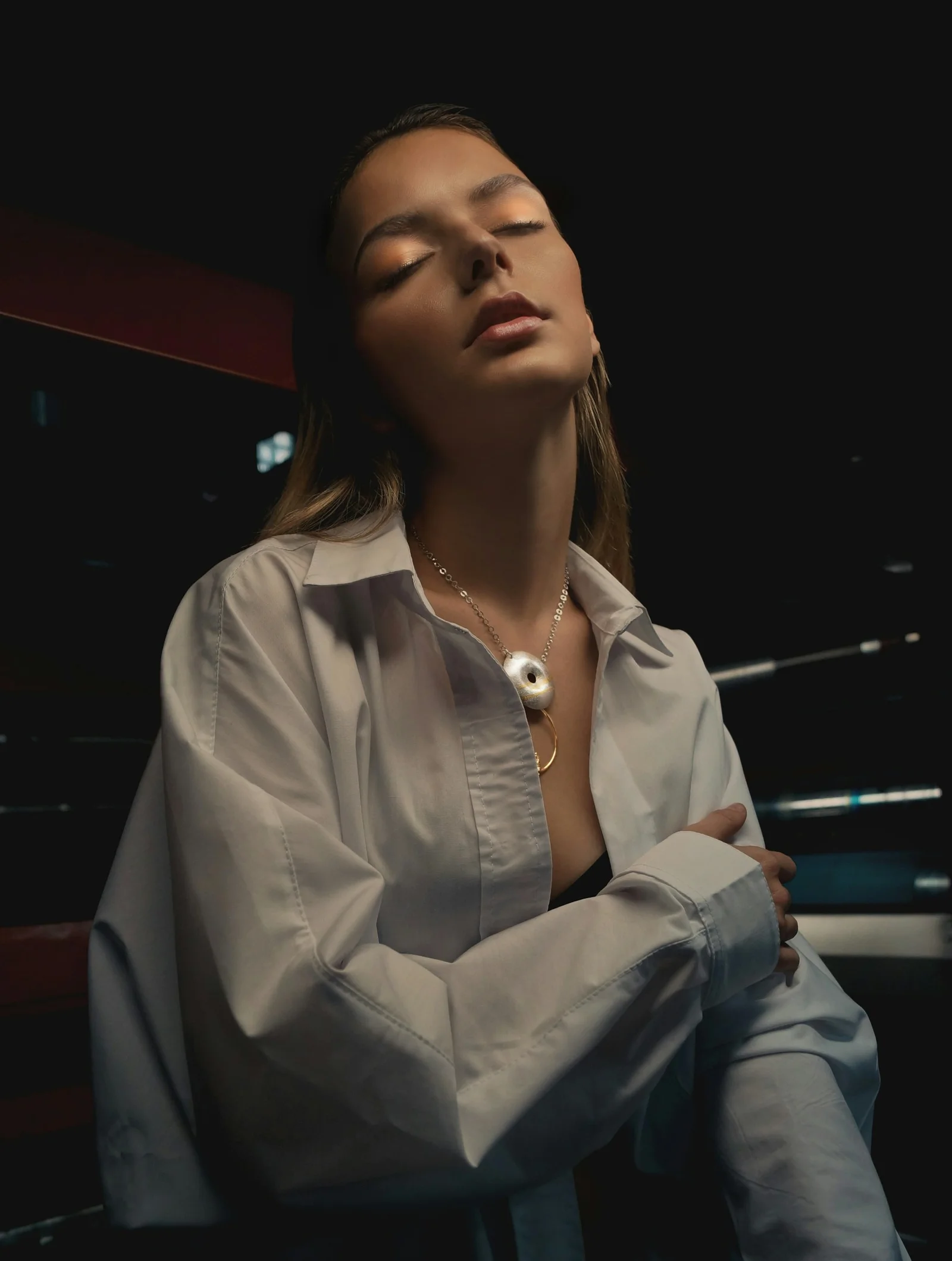 woman touching her left arm
