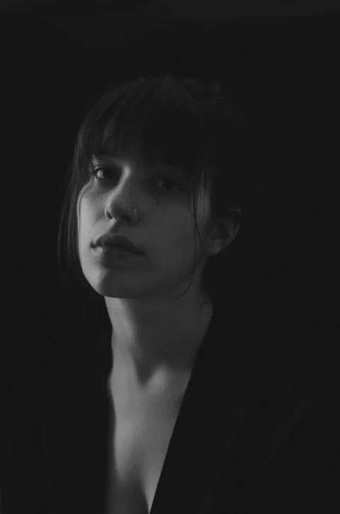 a black and white photo of a woman