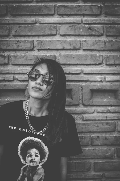 brick wall, fashion, necklace, person