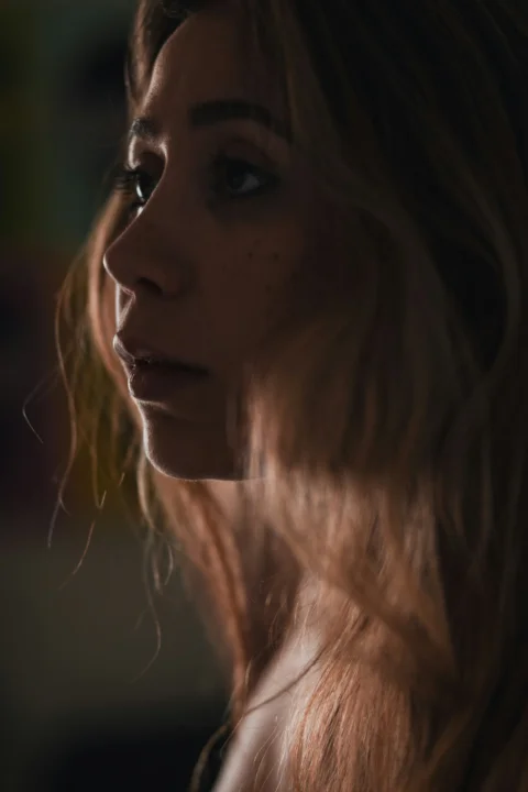 A close up of a woman with long hair