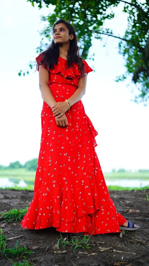 indian woman, red dress, outdoors, nature