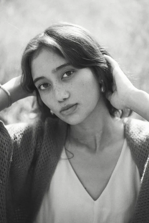 A black and white photo of a woman