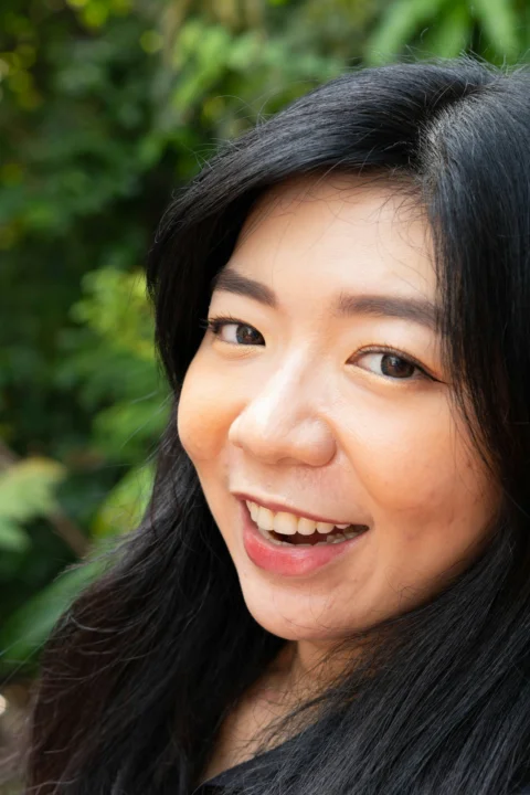 a woman smiling for the camera