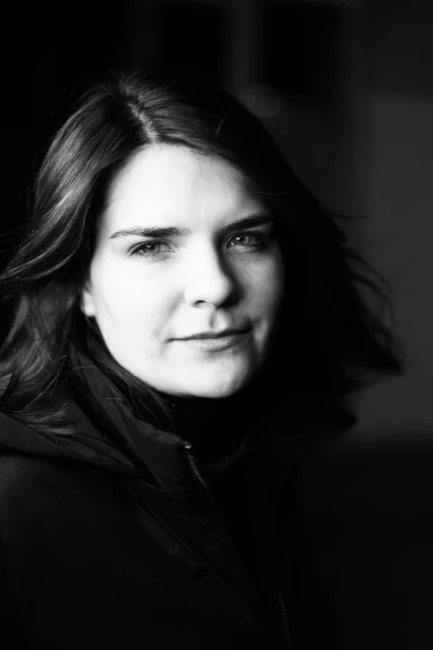 a black and white photo of a woman