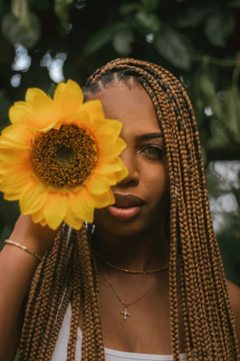 a person with a flower in the hair