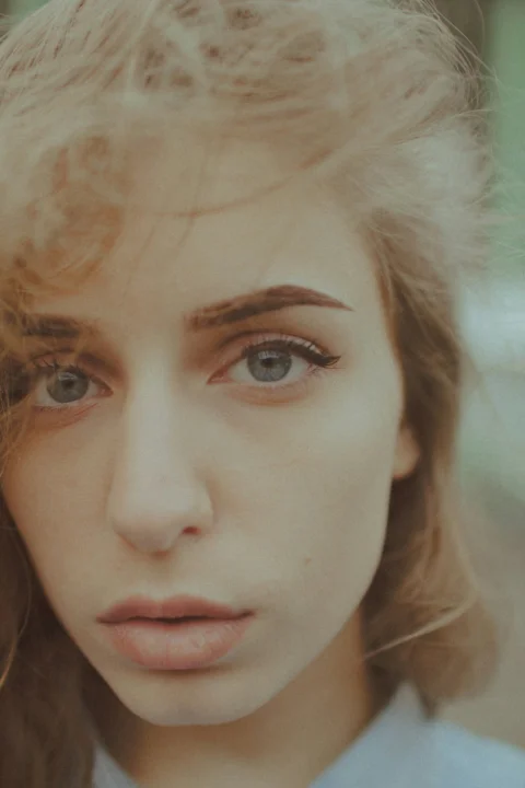 woman with brown hair and blue eyes