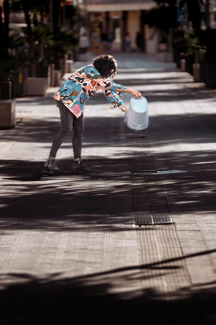 street, throwing bucket of water, road, path