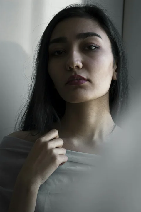 woman taking selfie inside room