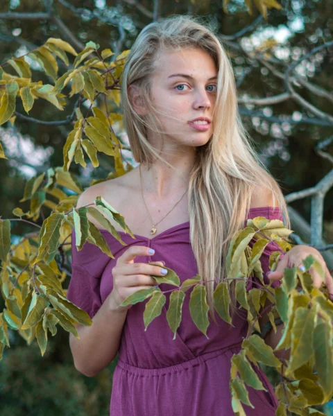a woman in a purple dress