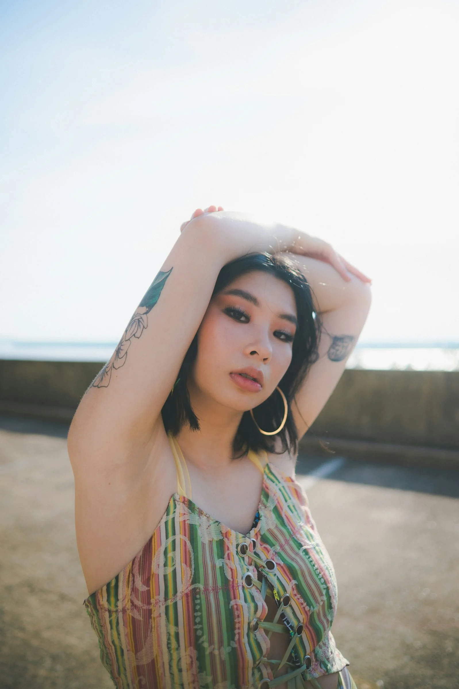a woman with tattoos on her head