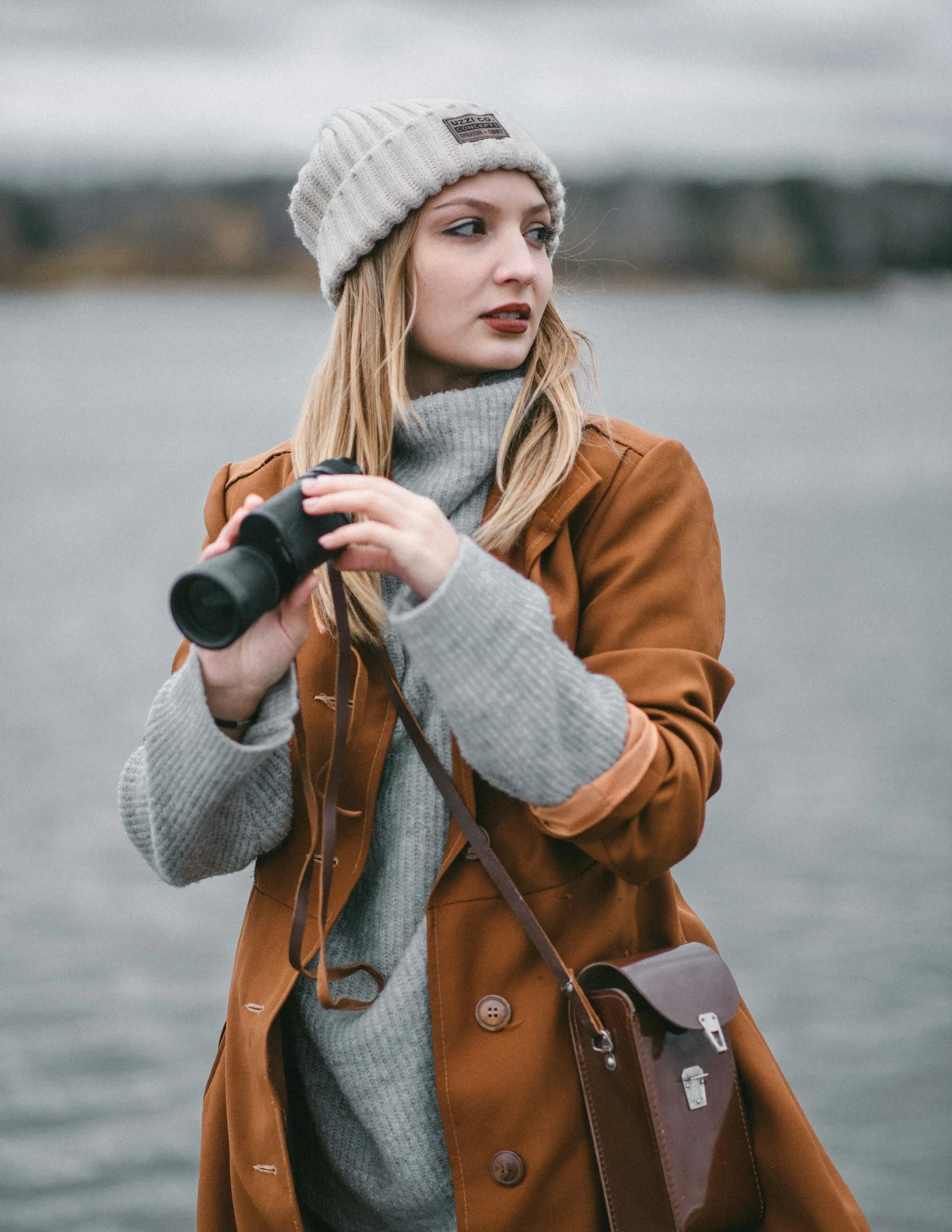 a person holding a camera