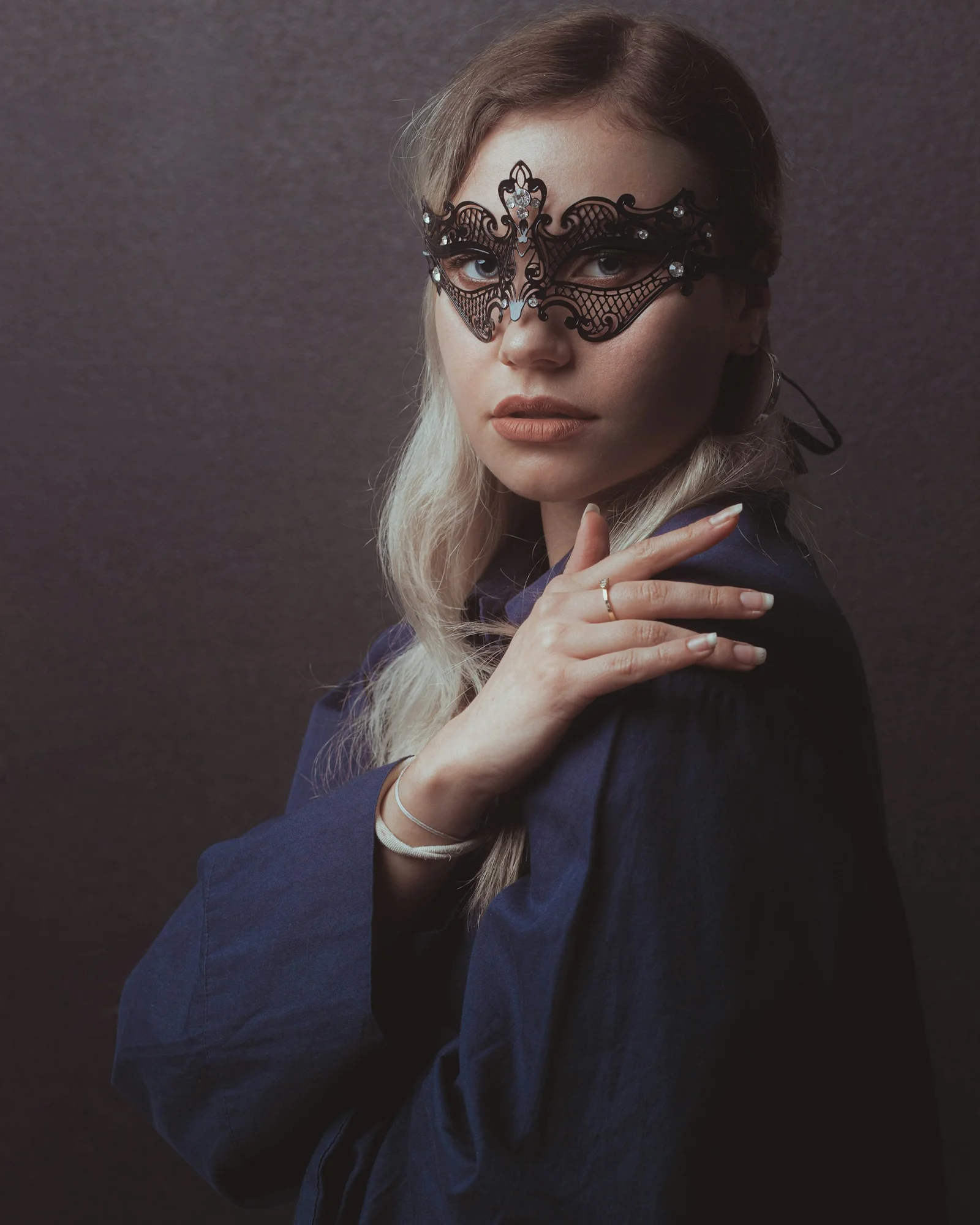 a woman with a mask on her face
