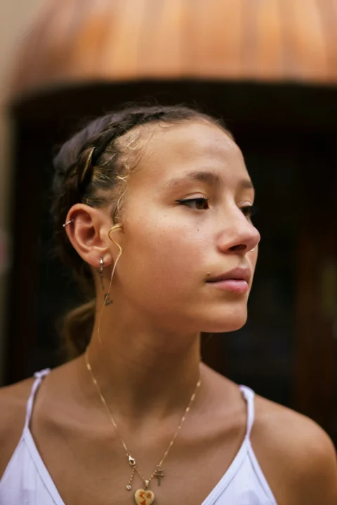 a woman with a necklace