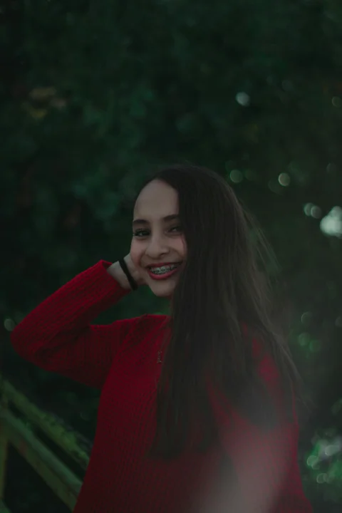 woman wearing red sweater