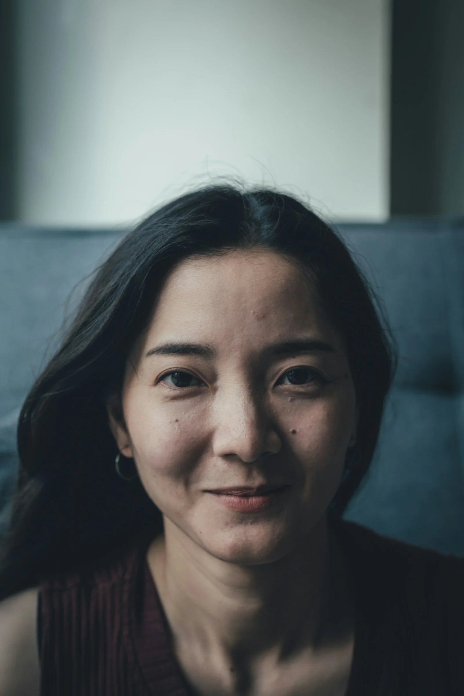 woman in black shirt smiling