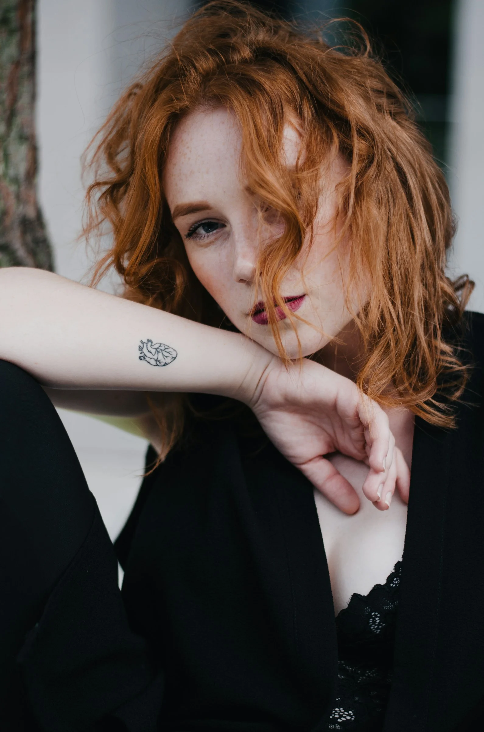woman wearing black tank dress