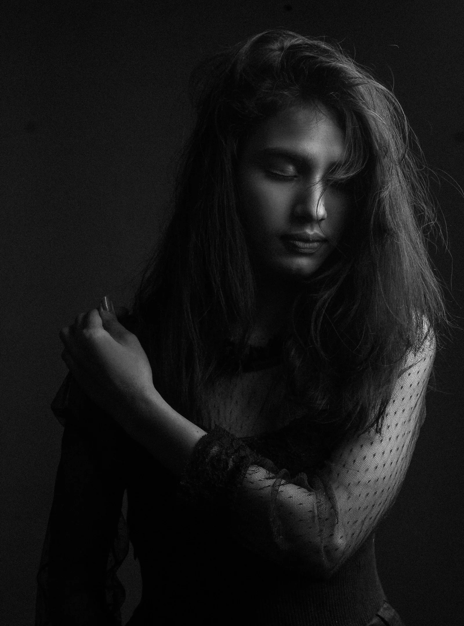 A woman's portrait in grayscale